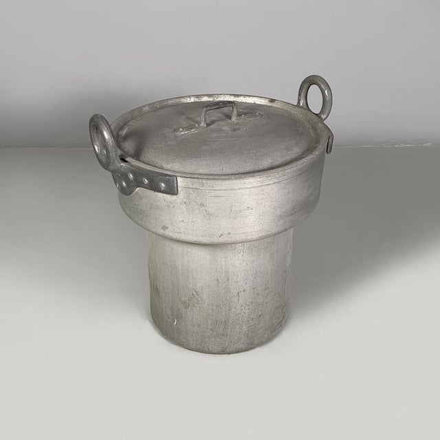 Italian round aluminum pot with lid, 1930s Pot or basket with lid, with round base, made entirely of aluminum. Two round...
