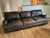 This is a Restoration Hardware distressed leather 96-inch sofa. I love the elegant rolling wheels, especially. The pillows...
