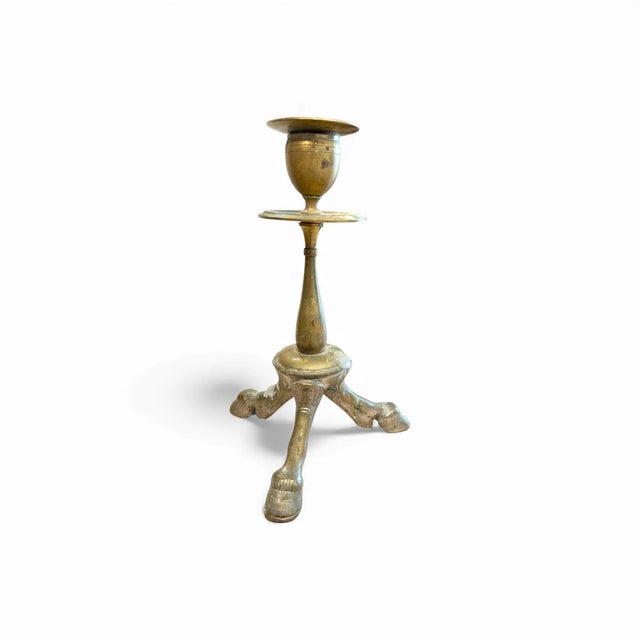 A striking pair of French bronze candlesticks from the 19th century, these sculptural forms reinterpret a classic motif...