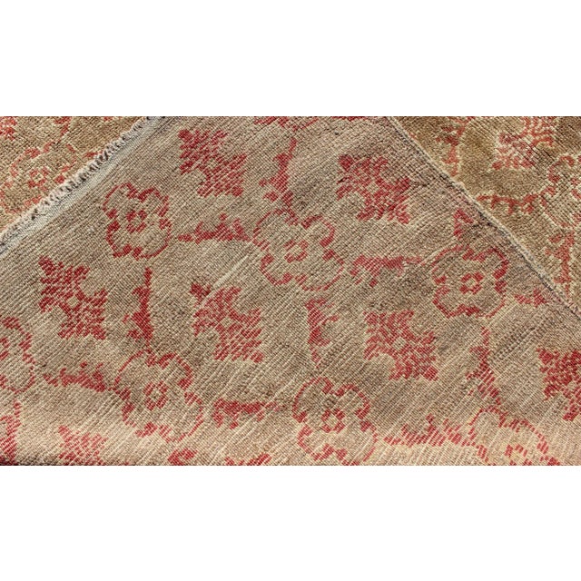 Textile Vintage Turkish Tulu Rug With Repeating Coral Motifs on a Faded Brown Green Field For Sale - Image 7 of 8