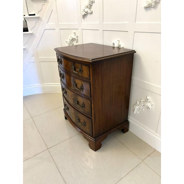 Antique Edwardian quality figured mahogany bow fronted chest of four drawers having a quality figured mahogany bow fronted...