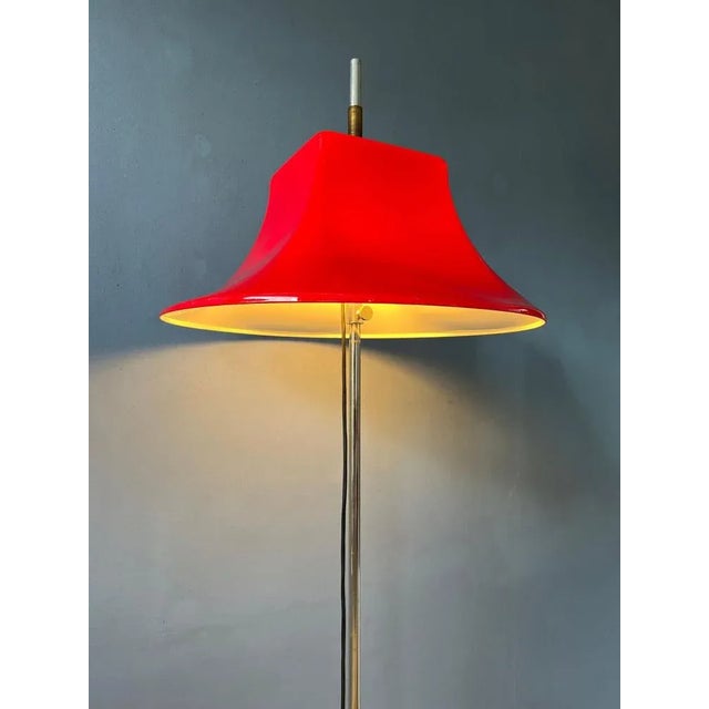 Very rare red space age floor lamp by Willem Hagoort with thick acrylic glass shade. The shade can be moved up and down...