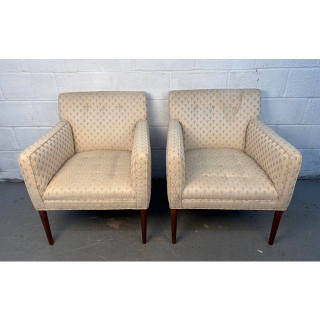 Timeless and inviting, this pair of vintage Scandinavian armchairs embodies the clean lines, thoughtful proportions, and...