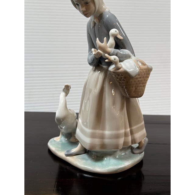 Design Plus Gallery presents the Porcelain Figurine Shepherdess with Ducks by Fulgencio Garcia. for Lladró. Quite a piece...