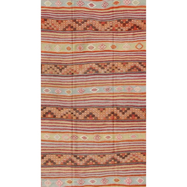 Vintage Turkish Kilim Rug, rug , country of origin / type: Turkey / Kilim, circa Mid-20th century Measures: 6'5 x 11'5....