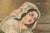 A tender and evocative example of late 19th-century European painting, this antique work dated 1877 beautifully captures...