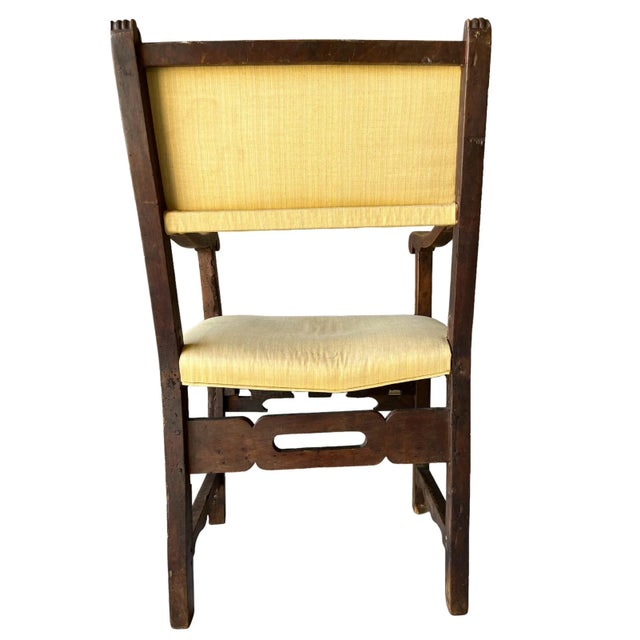 Spanish Renaissance Style chair. The chair is in original condition, but the upholstery has been changed.