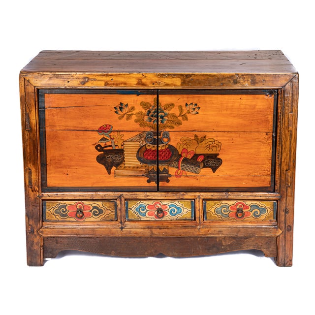 Offering this Gorgeous Sino Tibetan hand painted cabinet. Starting on a bracketed foot it rises to three lower drawers....