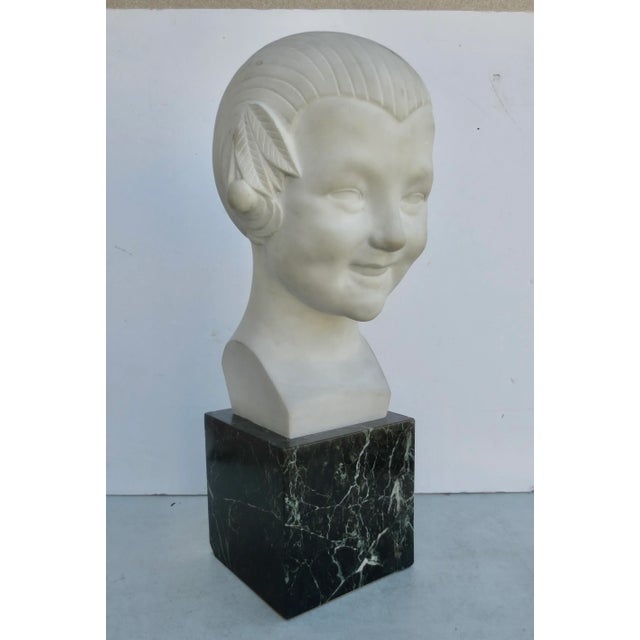 Gaston Herbemont (France Born 1883). Created in Marble, bronze, and Terra Cotta this very popular Art Deco young girl with...