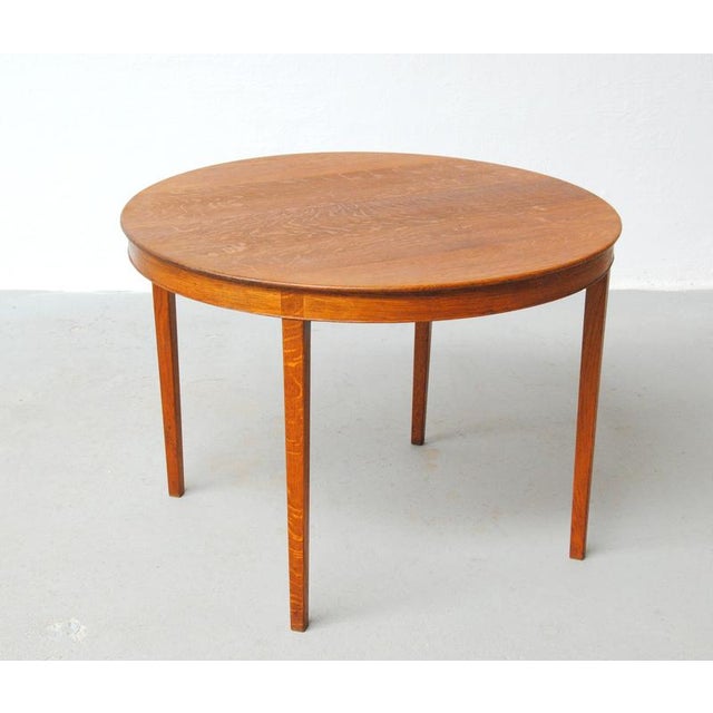 Danish A.J. Iversen side table in oak The circular side table in oak with elegant details was originally ordered as a...