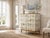 Vintage cabinet covered with illustrations ´Nordens Flora`by C.A.M Lindman, the same illustrations Josef Frank used when...