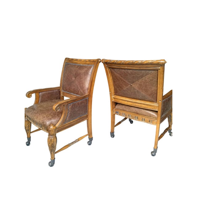 Elevate Your Game Nights with this Timeless Game Table and Matching Leather Chairs Introduce a touch of old-world grandeur...