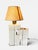 Splendid travertine sculptural table lamp by Fratelli Mannelli. The lamp consists of two travertine elements, one of which...