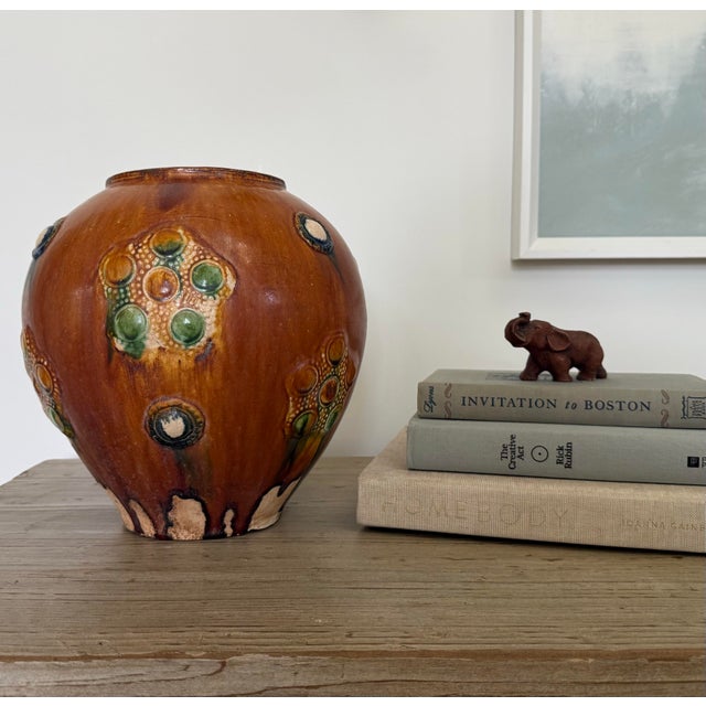 Bring global historical elegance to your space with this rare, striking 20th-century art pottery jar. This substantial...