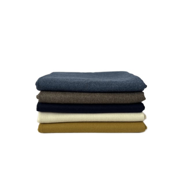 DESCRIPTION Luxuriously soft wrap / throw blanket loomed from 100% baby alpaca for the softest, year-round, warmth....