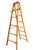 Vintage solid wood painter’s stepladder featuring the original folding paint shelf/tool tray and metal support braces....