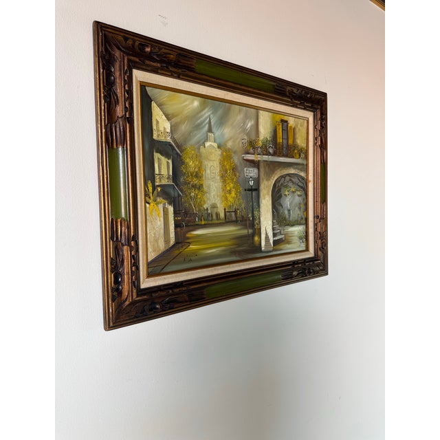 A captivating 1970s original oil on masonite painting by artist Lisa, depicting a charming French Quarter street scene in...