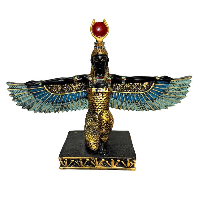 This brass tabletop sculpture depicts the Egyptian goddess of motherhood, protection, and healing known as Isis....