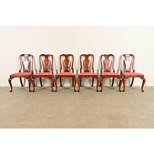 An outstanding set of six Queen Anne or Georgian style dining chairs By Henkel Harris USA, Circa 1970s Solid cherry wood...