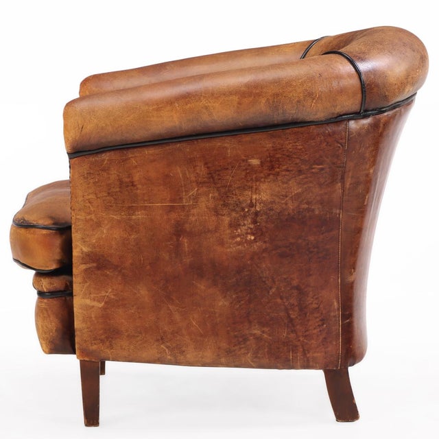 With a vertically segmented backrest that adds both visual interest and supportive comfort, this chair’s classic, deep...