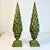 Laurel leaves are usually crafted into a wreath as a decor item. But these topiaries are lovely in their deep olive green...