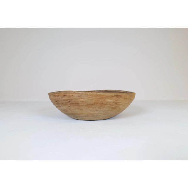 An antique and unique organic wooden bowl. With highly appealing patina, with traces of use. Produced in Sweden, 19th...