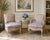 This refined pair of armchairs by Henredon is designed in the classic French fauteuil tradition, combining graceful...