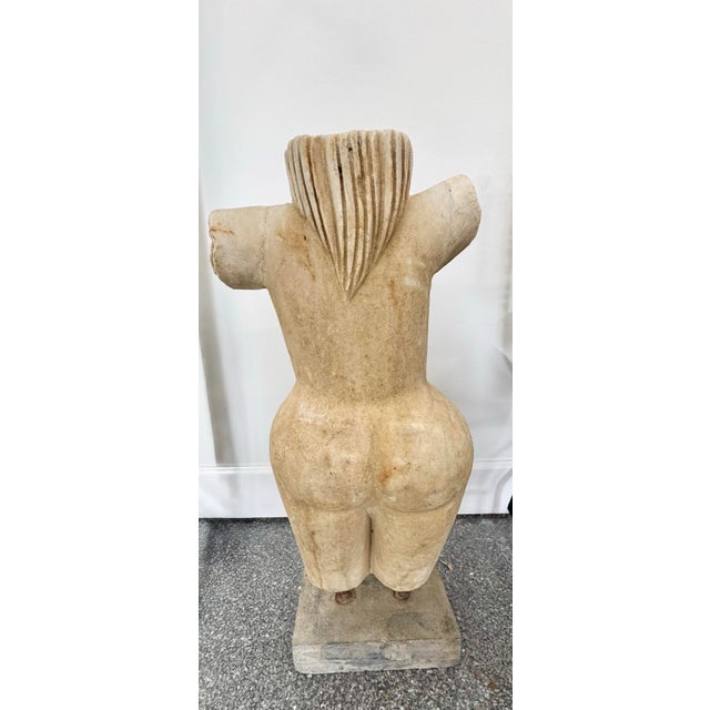 A impactful and exceptionally heavy (approx. 90 lbs) sculptural work, this torso is a masterful 20th-century...