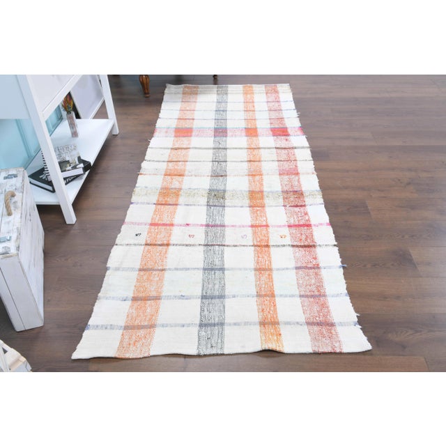 Vintage Turkish Hand-Knotted vintage rug is a semi-antique vintage kilim runner rug.'70s Eastern region of Turkey's unique...