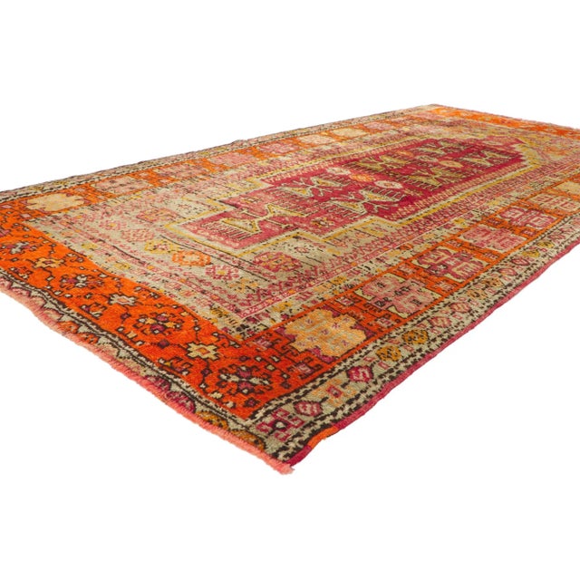 52442 Vintage Turkish Oushak Rug, 04’05 x 08’07. Bright orange hues burst forth from every detailed aspect of this vintage...