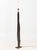 Petrified Wood Floor Lamp, mounted on rectangular iron base. 71" H x 10" W x 6.75" D. Provenance: From a One Central Park...