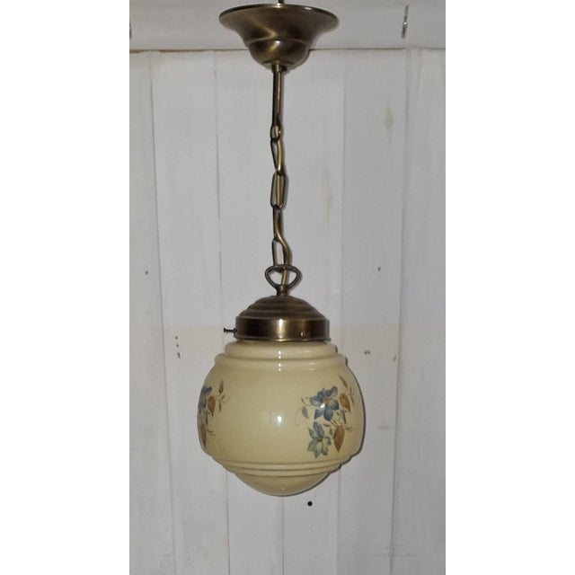 Art Deco Ceiling Lamp with Beige Glass Shade on a Brass Mount, 1930s, in Very Good conditions. Designed 1920 to 1949 Up to...