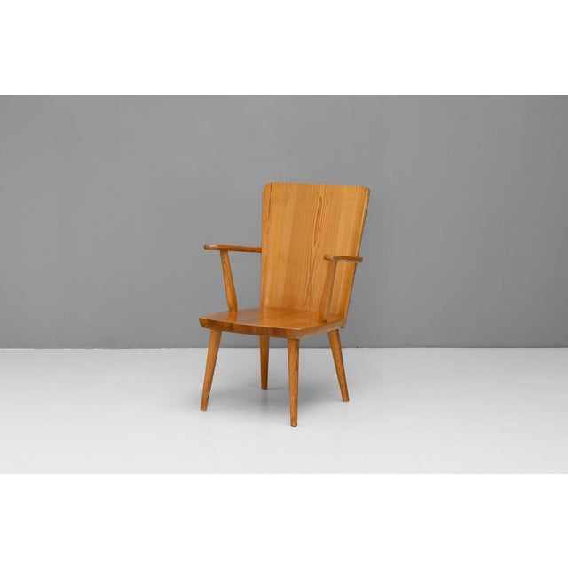Solid pine armchair by Göran Malmvall. Great original condition. Sweden circa 1950. This piece has an attribution mark, I...