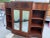 Here we have a very pretty vintage 1940's Neoclassical Mahogany Console Cabinet. Super stylish storage and display for...
