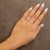 Early 21st Century 10K White Gold 1/4 Cttw Lab Grown Diamond Vertical Three Stone Ring - Size 6.5 For Sale - Image 5 of 6