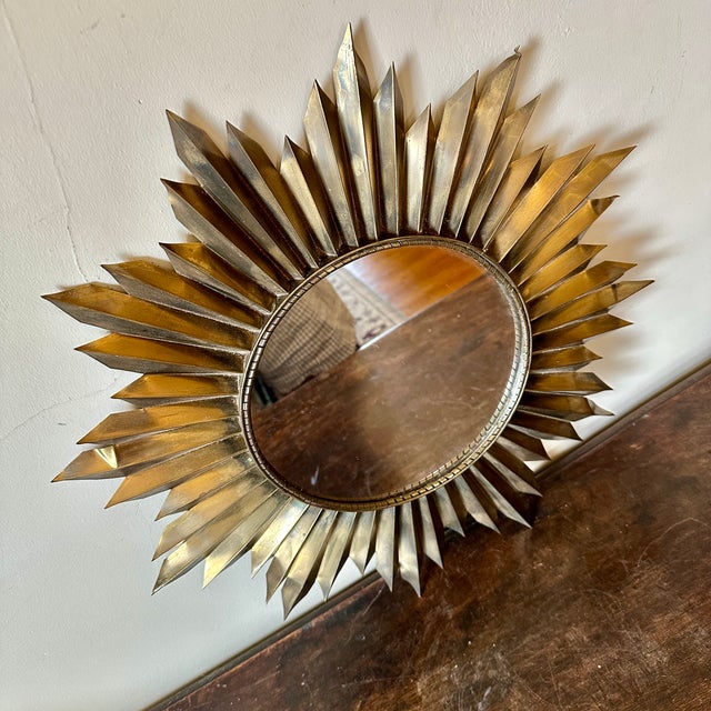 Vintage brass sunburst mirror.
