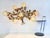 Large wall lamp from the 1960s/70s in the style of Hans Kögl, likely from Italy. Gold-plated and cream-white lacquered...