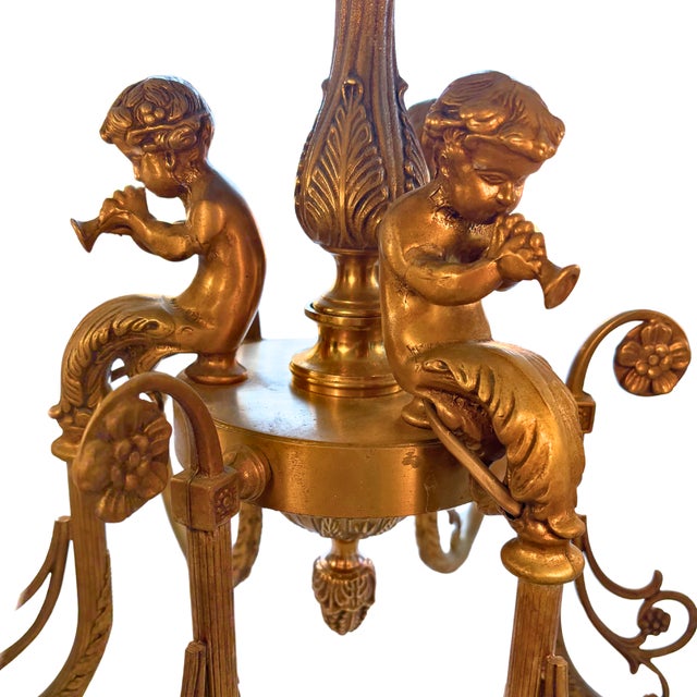 This stunning louis xv-style figural chandelier celebrates fine craftsmanship and romanticism. a late 19th-century neo-...