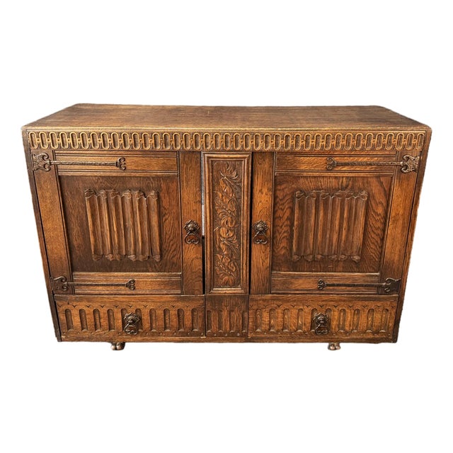 Antique Carved Oak Buffet With Metal Hardware For Sale