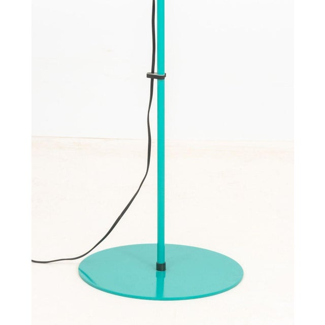 Modern Green Enameled Adjustable Floor Lamp. One configuration: 53" H x 19" W x 11.25" D. Provenance: From a Long Island,...