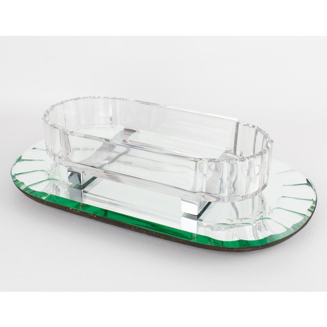 Exceptional Art Deco Baccarat Crystal Centerpiece, France, circa 1930 This sculptural crystal centerpiece was designed and...