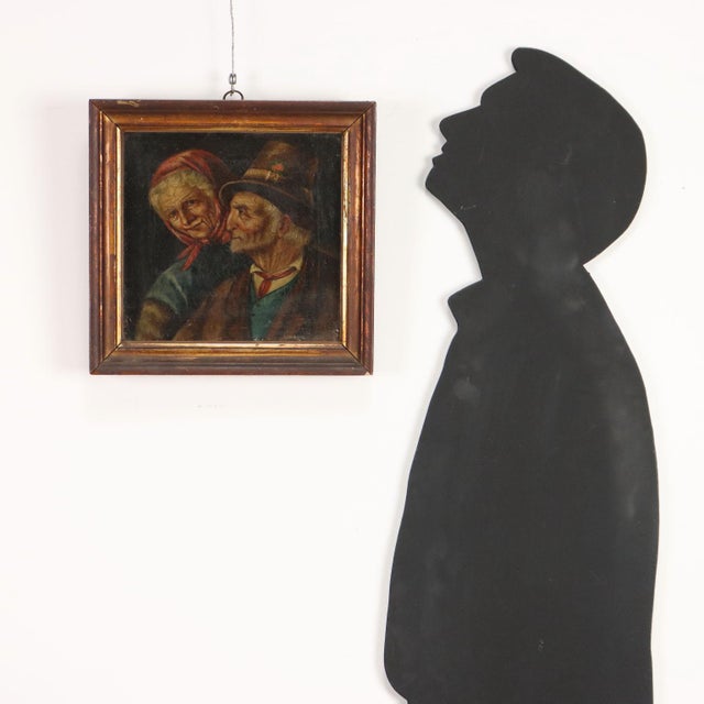 Oil on canvas. Half-length portrait of an elderly peasant couple, she with her head covered by a red handkerchief, he with...