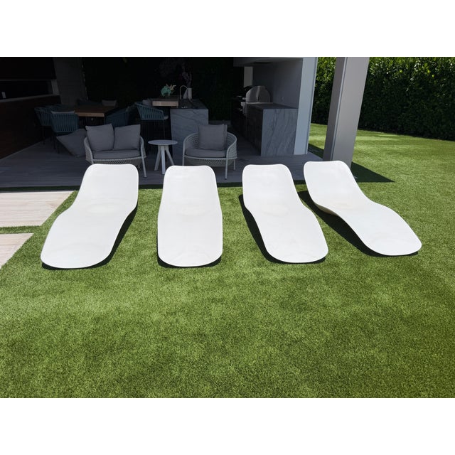 4 Talenti Reef by Marco Acerbis pool chairs. Each chair has a drain on the bottom that is plugged to fill with water so it...