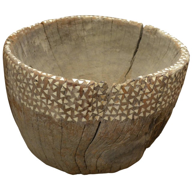 This antique teak wood bowl was originally used to pound rice. We added the shell inlay. This bowl was sourced in the...