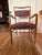 Easy chair in a wood frame, fluid lines give a sculptural elegant detail to armrests. originally designed by John Van...