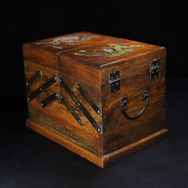 A beautifully crafted and cleverly designed Chinese wooden box, likely made of Huali (rosewood). The box features an...