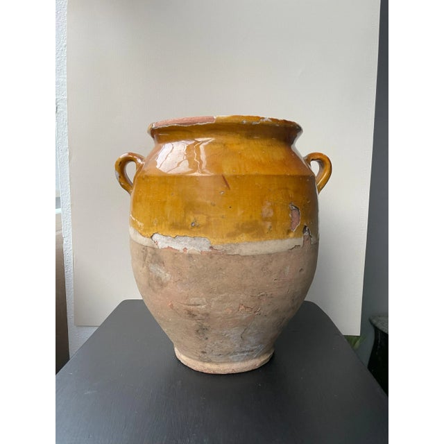 Beautiful small confit jar with its characteristic yellow glaze. Confit jars were used primarily in the South of France...