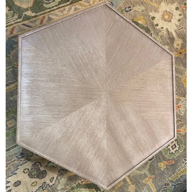 Elevate any room with this hexagon shape cocktail table, beautifully wrapped in extra-fine sisal in a linen hue. The...