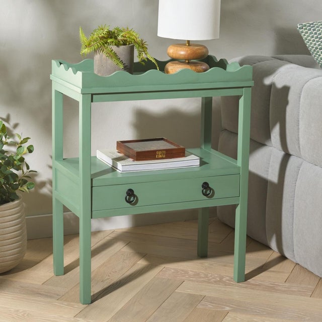 Enhance your space with the Darlyn Rectangle Accent Table in a soothing Sage hue. This versatile table features a clean...