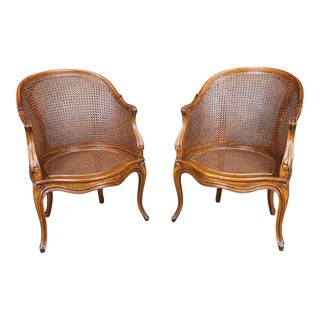 Fine Pair French Louis XV Style Cane Back Bergère Chairs in Walnut Circa 1940s For Sale